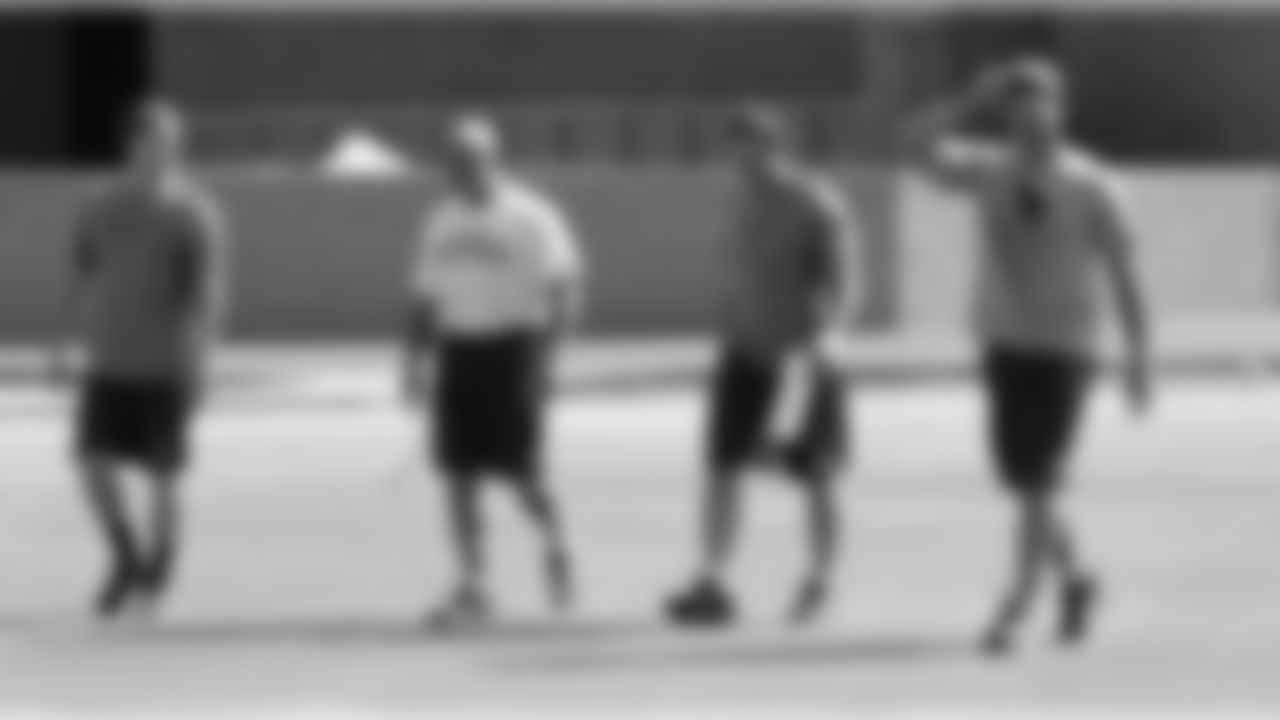 K Danny Hrapmann, strength and conditioning coach Buddy Morris, K Jay Feely and LS Mike Leach