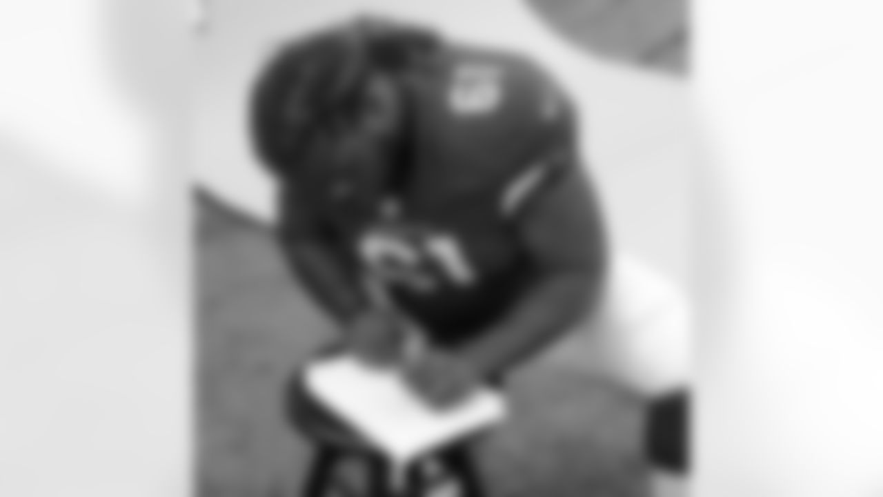G Jonathan Cooper leaves his autograph for a "Sunday Night Football" graphic