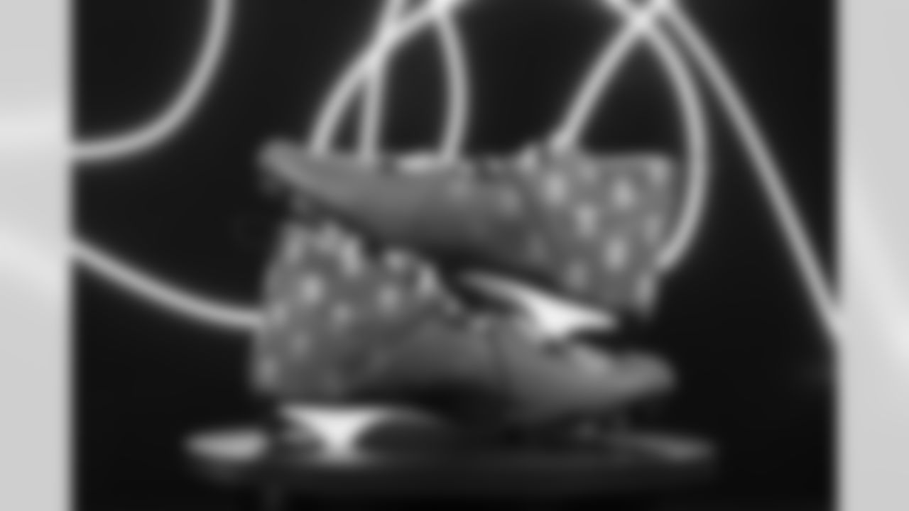 Arizona Cardinals defensive end Jonathan Ledbetter's cleats representing Operation Hope and Youth Financial Literacy for the 2022 NFL My Cause My Cleats initiative.