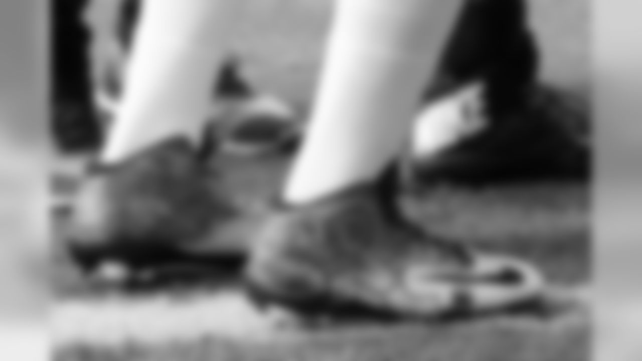 Campbell wearing cleats to support his "CRC" charity