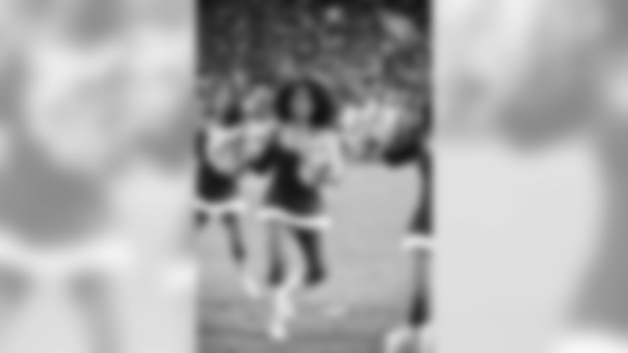 Images of Cardinals cheerleader Tequasia during the 2019 season