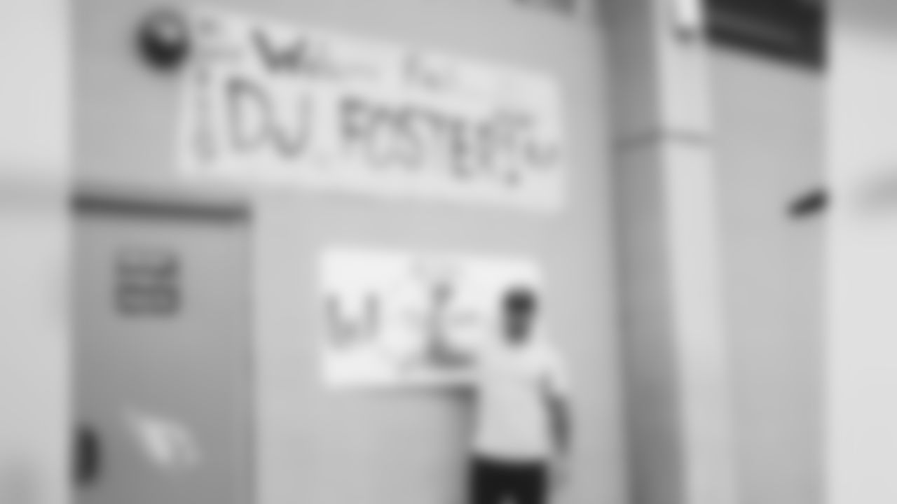 RB D.J. Foster with his sign
