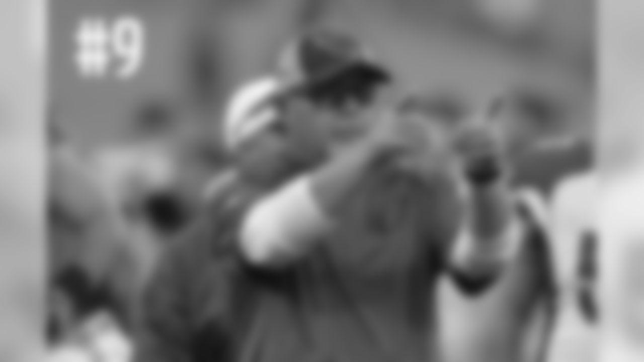 Coach Bruce Arians points to the Cardinals fans in the crowd after the win