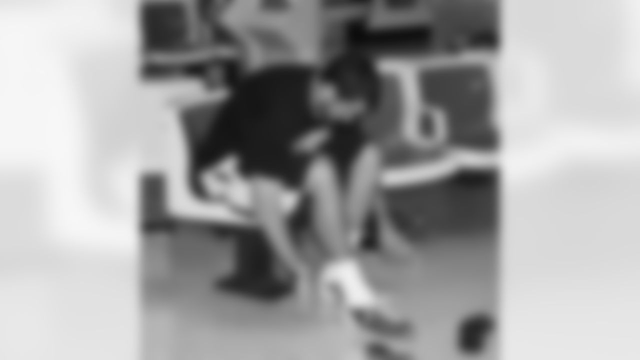 Matt Leinart puts on the stylish shoes