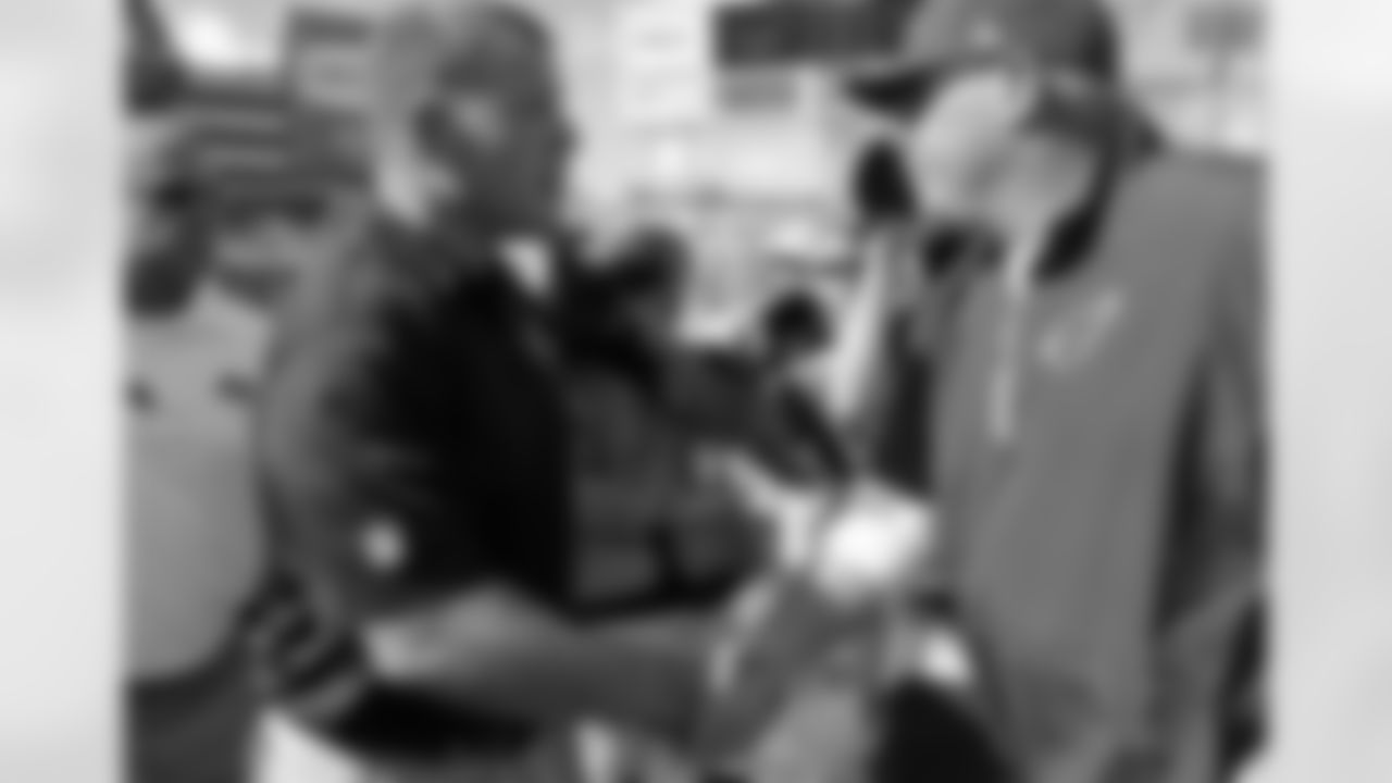 Coach Bruce Arians and Buccaneers coach Greg Schiano
