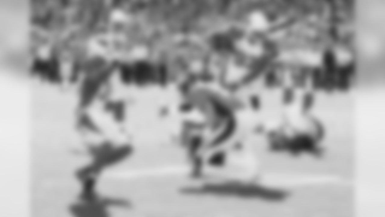 DE Calais Campbell returns an interception against the Broncos