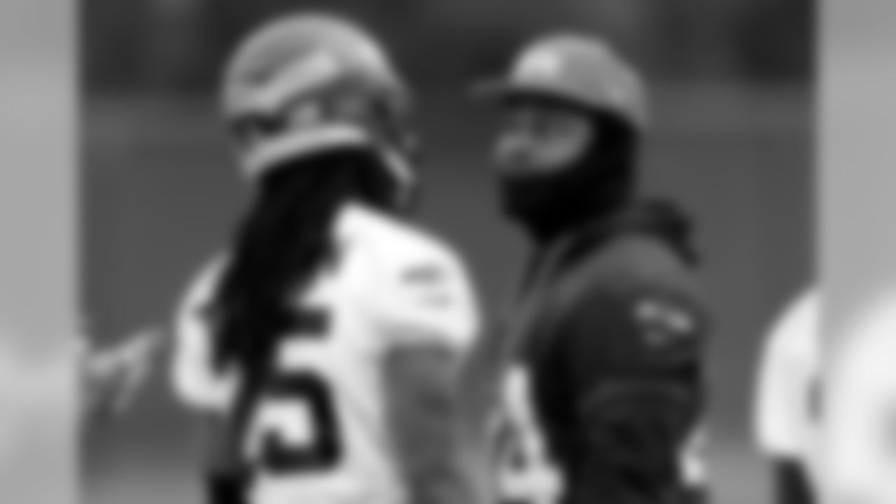 CB Richard Sherman (left) and RB Marshawn Lynch at Seahawks practice
