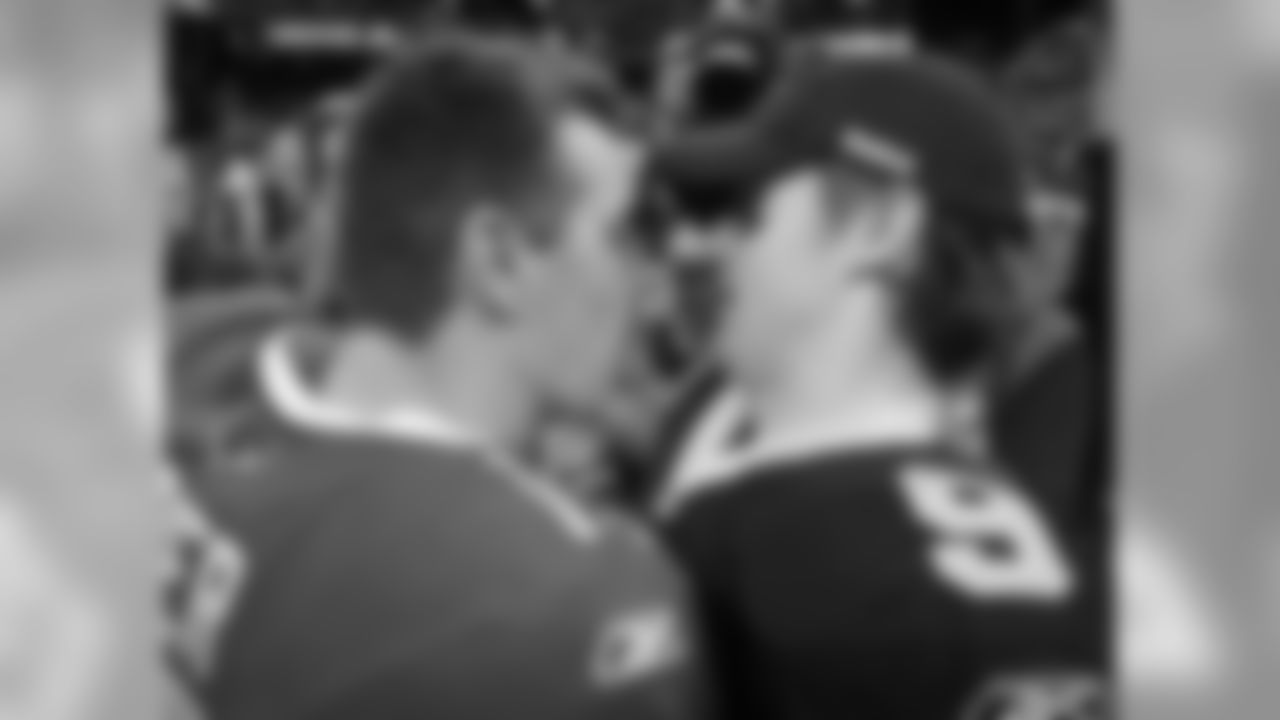 Warner with Saints QB Drew Brees after his final game