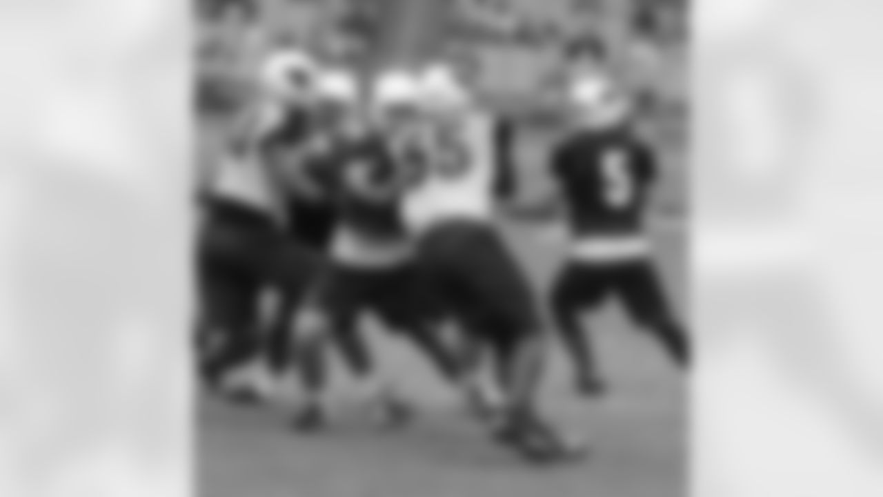 T Nate Potter tries to hold off LB Karlos Dansby