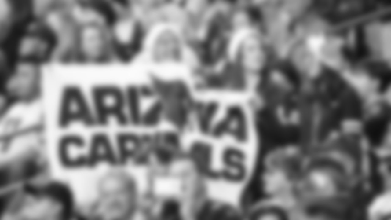 Images of Cardinals fans at State Farm Stadium during the Week 14 matchup against Detroit