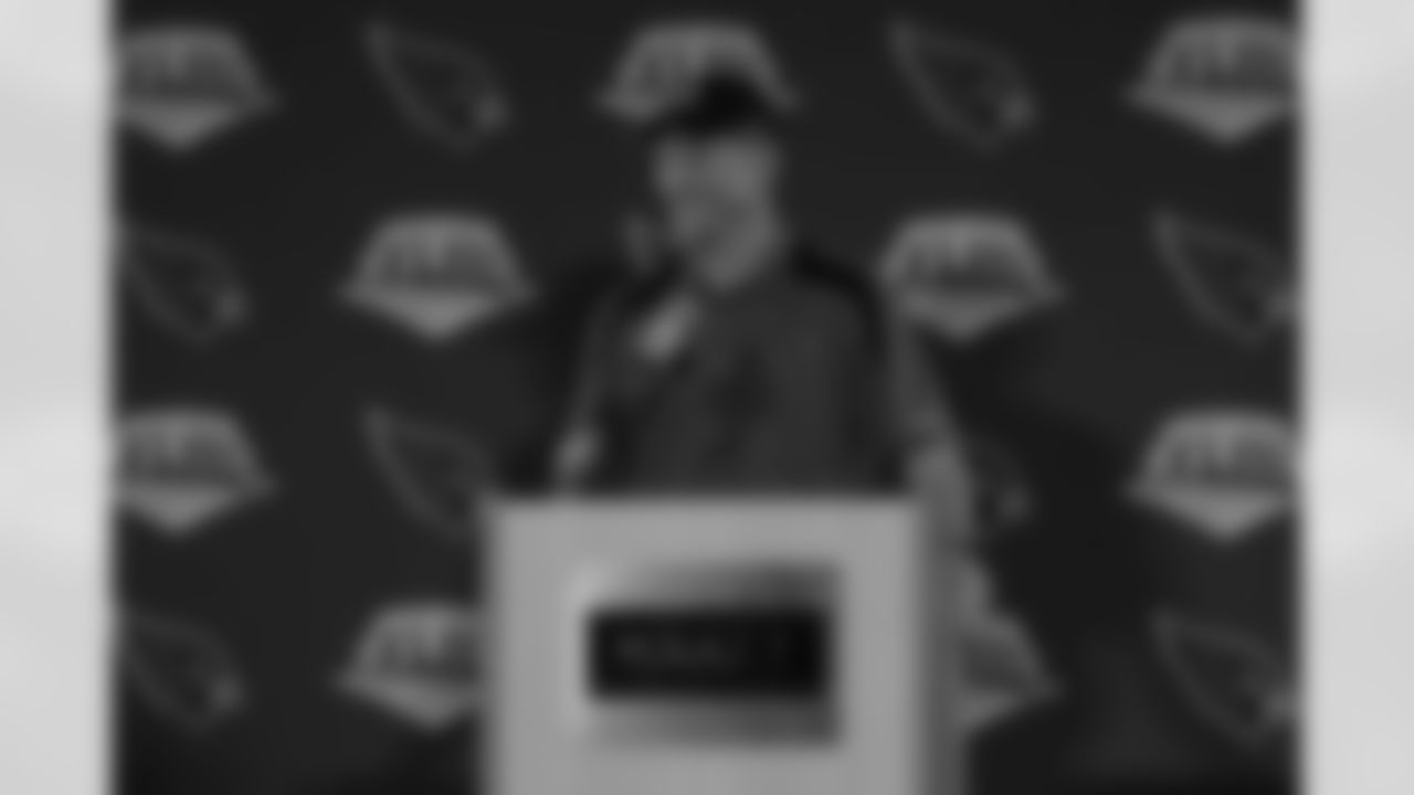 Coach Ken Whisenhunt enjoys a question