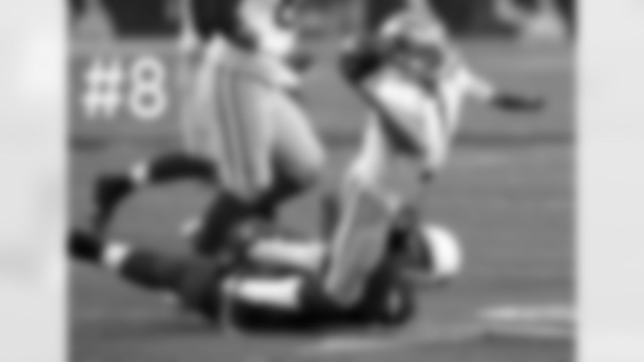 DE Calais Campbell pulls down Colin Kaepernick.