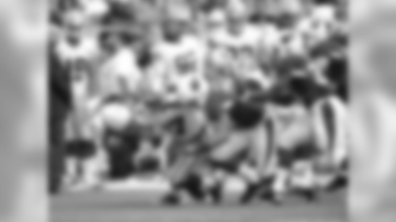Justin Bethel and Lorenzo Alexander force a fumble
