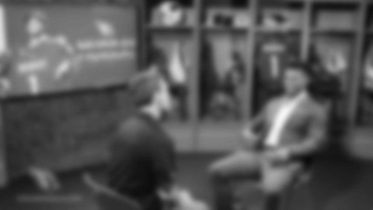 Kyler Murray does an interview.