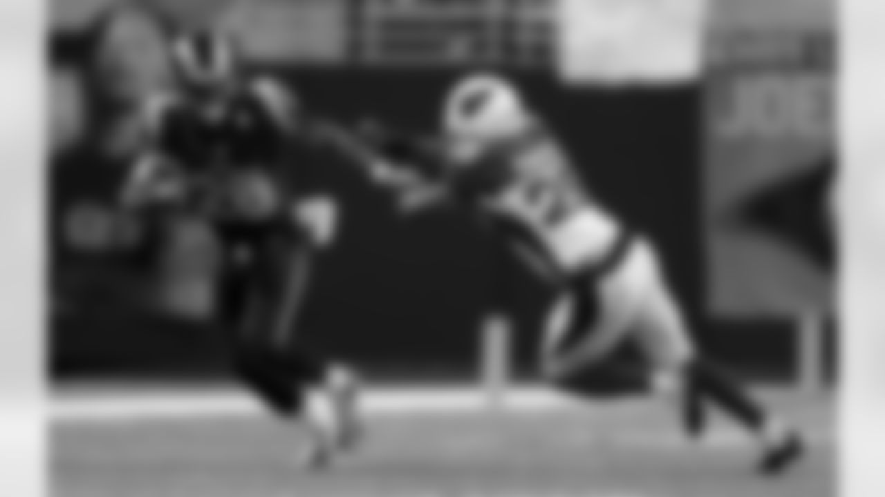 CB Jerraud Powers can't bring down RB Daryl Richardson