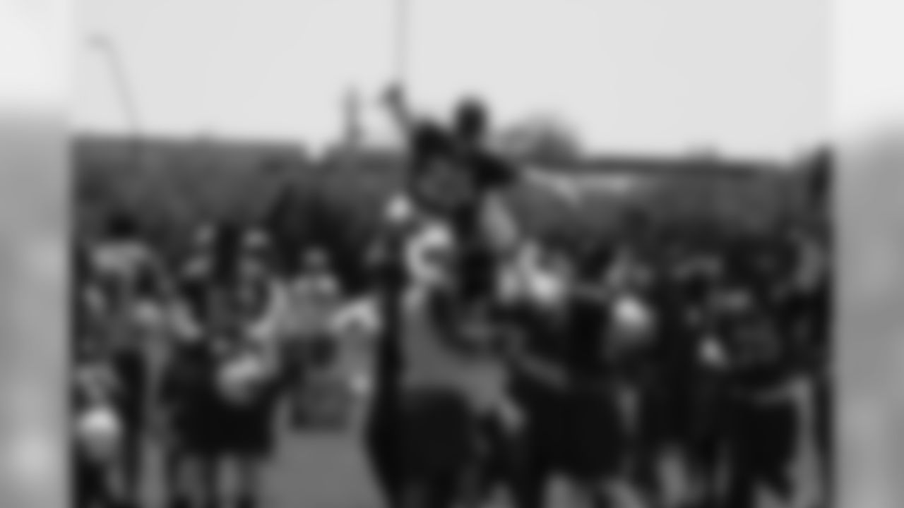 2008: CB Ralph Brown is hoisted up after hitting a FG