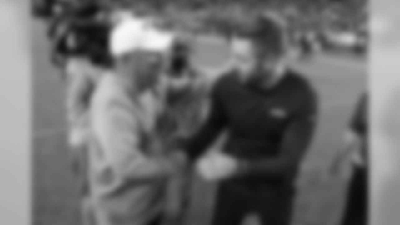 Denver Broncos head coach Vic Fangio (left) greets Arizona Cardinals head coach Kliff Kingsbury after an NFL preseason football game, Thursday, Aug. 29, 2019, in Denver. The Broncos won 20-7.