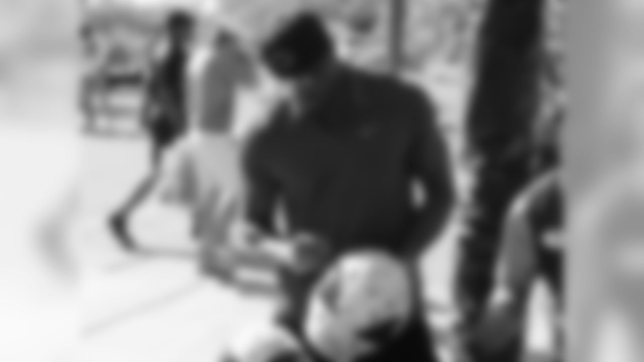 S Deone Bucannon signs a helmet