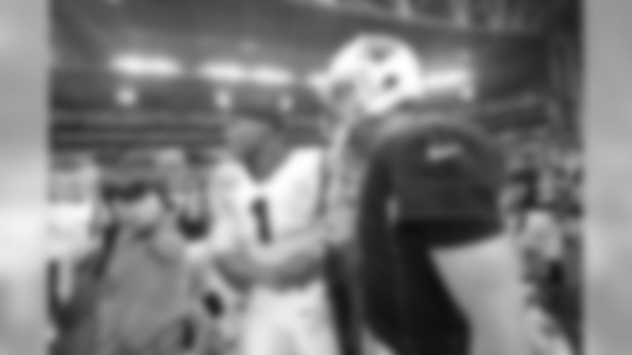 QB Carson Palmer and Panthers QB Cam Newton