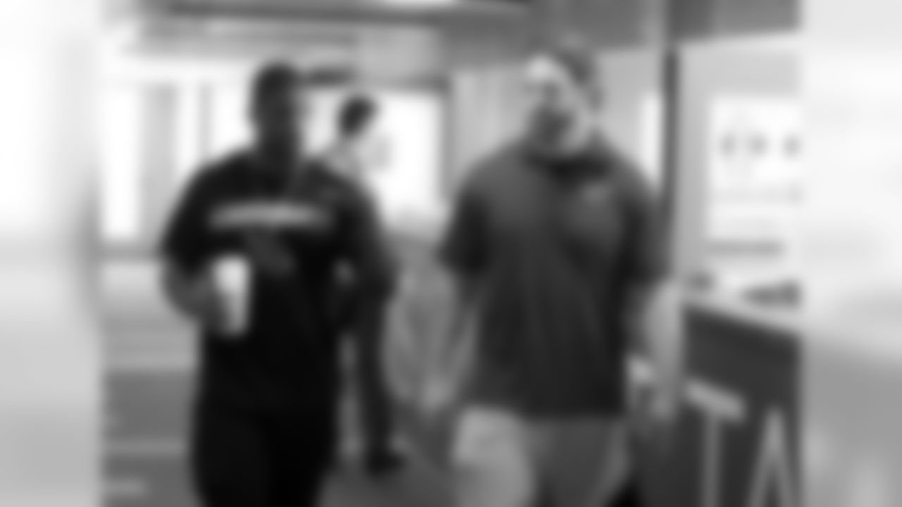 Mathis (right) getting a facilities tour from scout Adrian Wilson