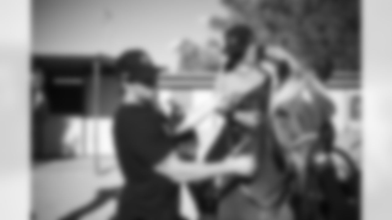 The Arizona Cardinals visit Hunkapi Farms to work with therapy horses and families with ALS on Saturday, May 13, 2023 in Scottsdale, AZ.