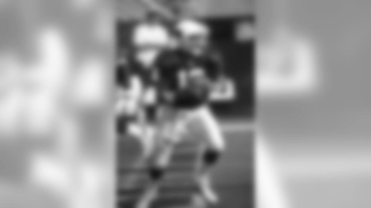 2001: QB Jake Plummer looks for an open receiver
