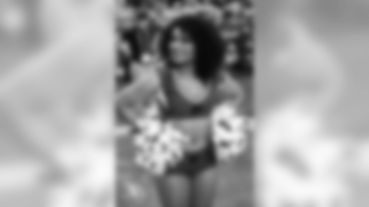 Images of Cardinals cheerleader Tequasia during the 2019 season