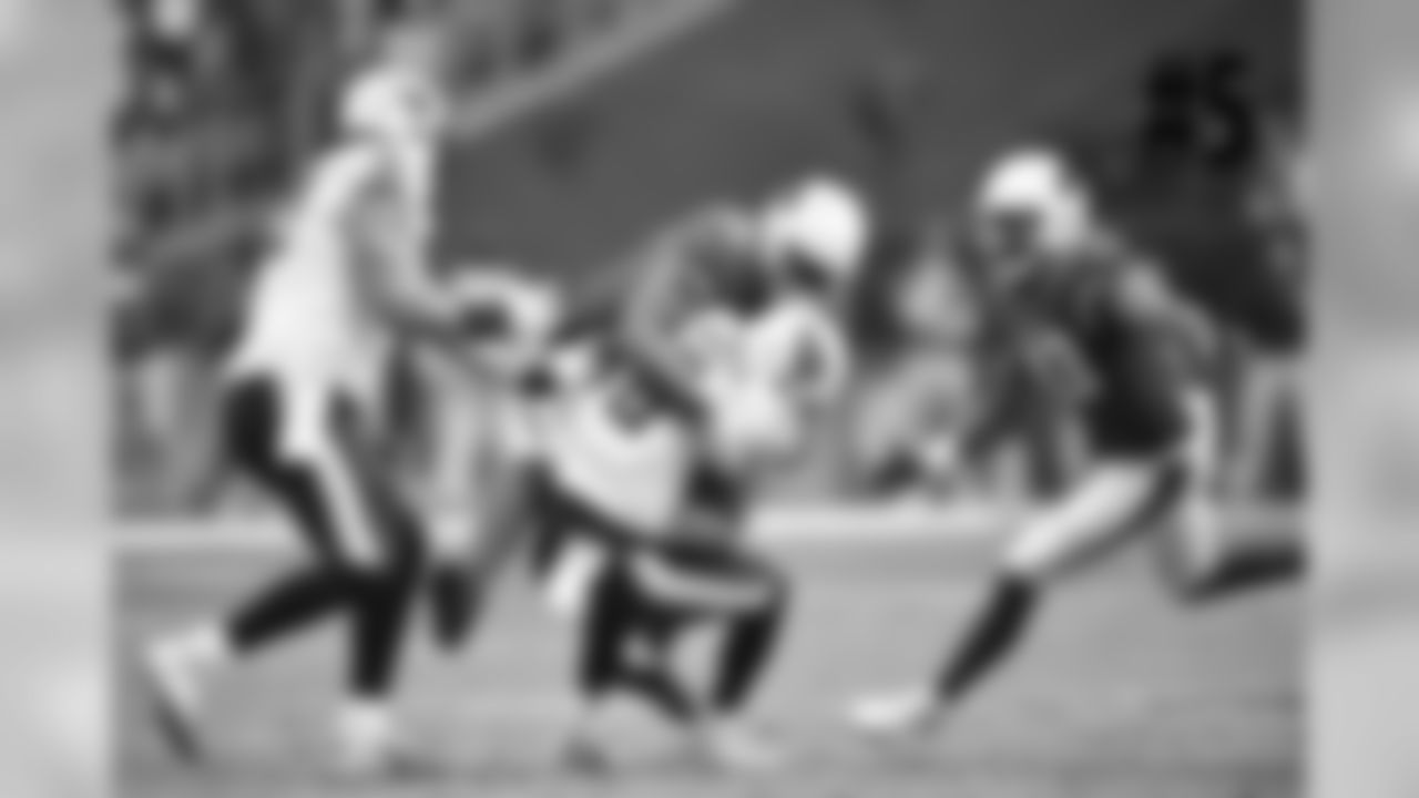 DL Olsen Pierre grabs a sack