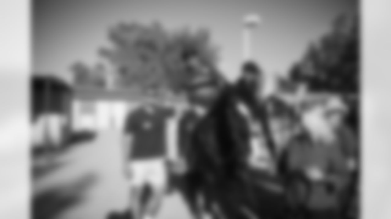 The Arizona Cardinals visit Hunkapi Farms to work with therapy horses and families with ALS on Saturday, May 13, 2023 in Scottsdale, AZ.