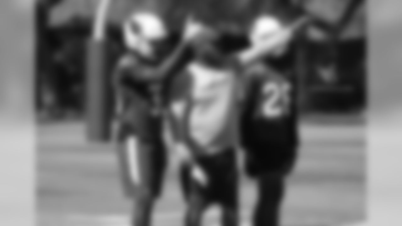 CB Elie Bouka (left) with cornerbacks coach Kevin Ross