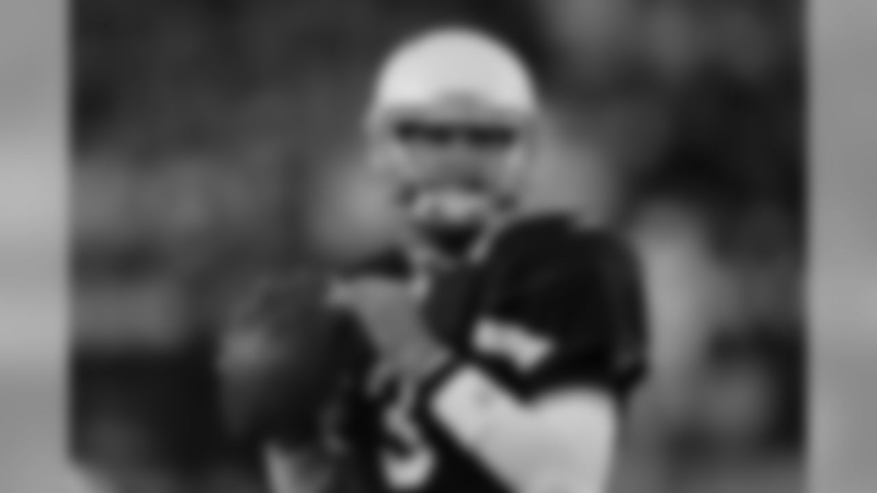 Derek Anderson warming up before the game