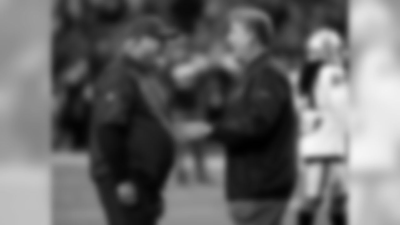 Coach Bruce Arians with Raiders coach Jack Del Rio