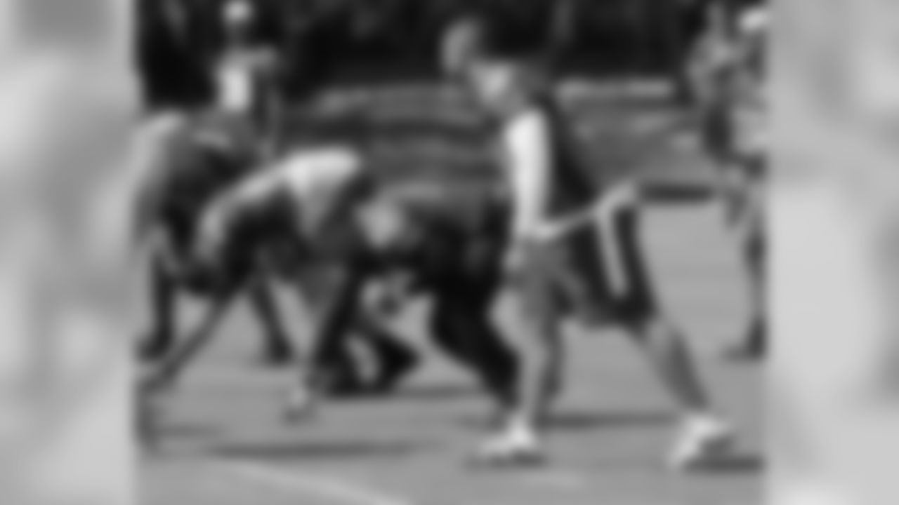 Matt Shaughnessy (91) working as a down defensive lineman