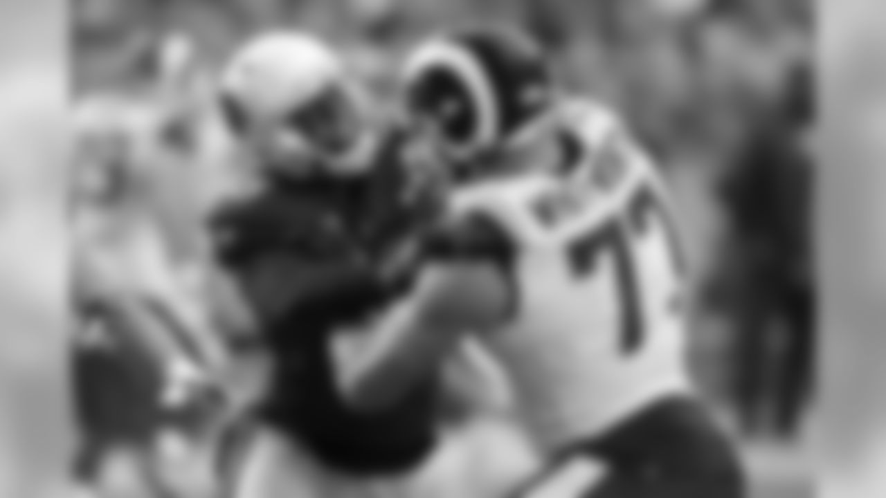 Cardinals linebacker Chandler Jones battles Rams offensive tackle Andrew Whitworth.