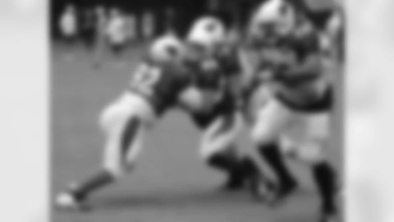 NT Dan Williams battles C Lyle Sendlein
