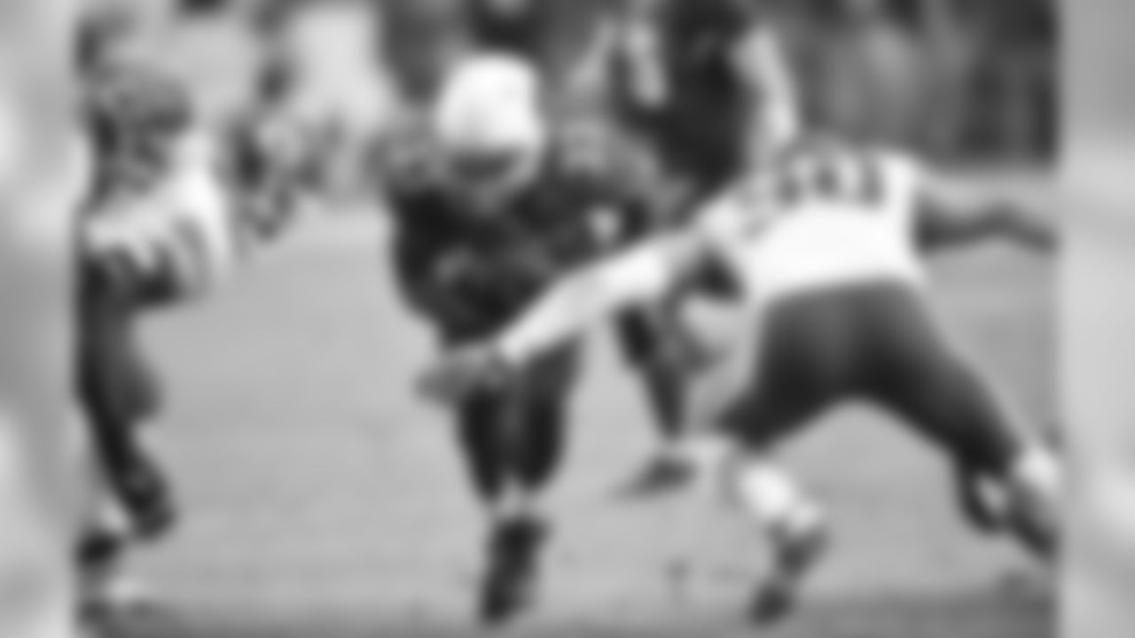 RB Kerwynn Williams on his way to an unexpected 100 yard rushing day