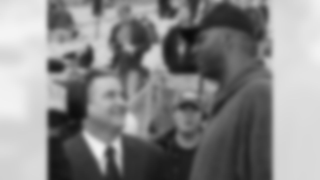 The odd couple: Steve Mariucci and John Salley