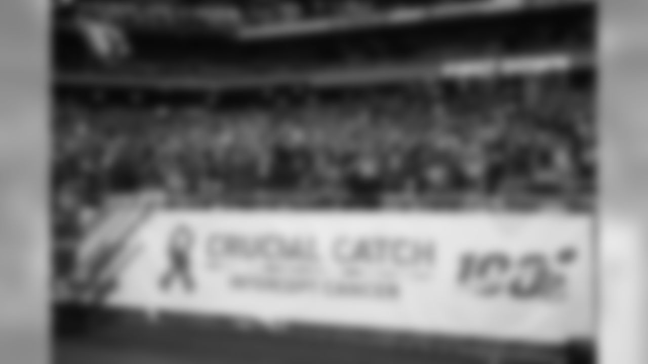 Images from halftime of the Falcons game, where Cardinals cheerleaders performed with cancer survivors and their caregivers to raise awareness for early detection and prevention