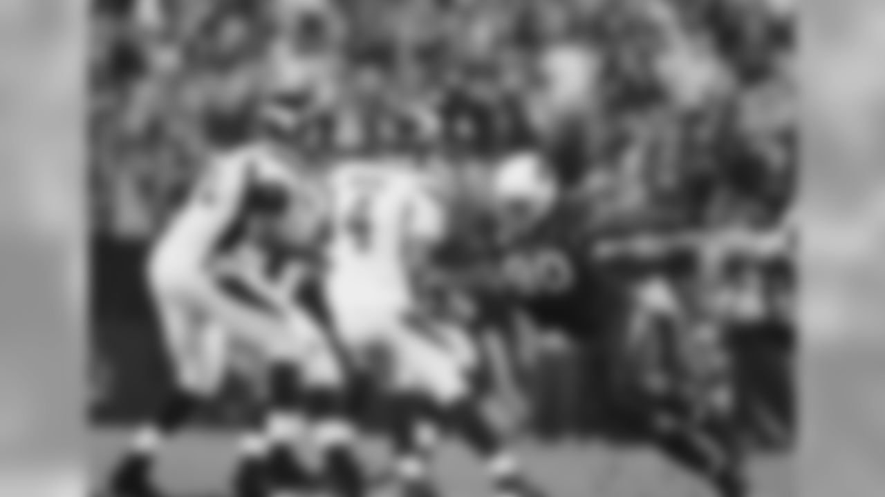 2009 vs. Vikings: Darnell Dockett bears down on Brett Favre.