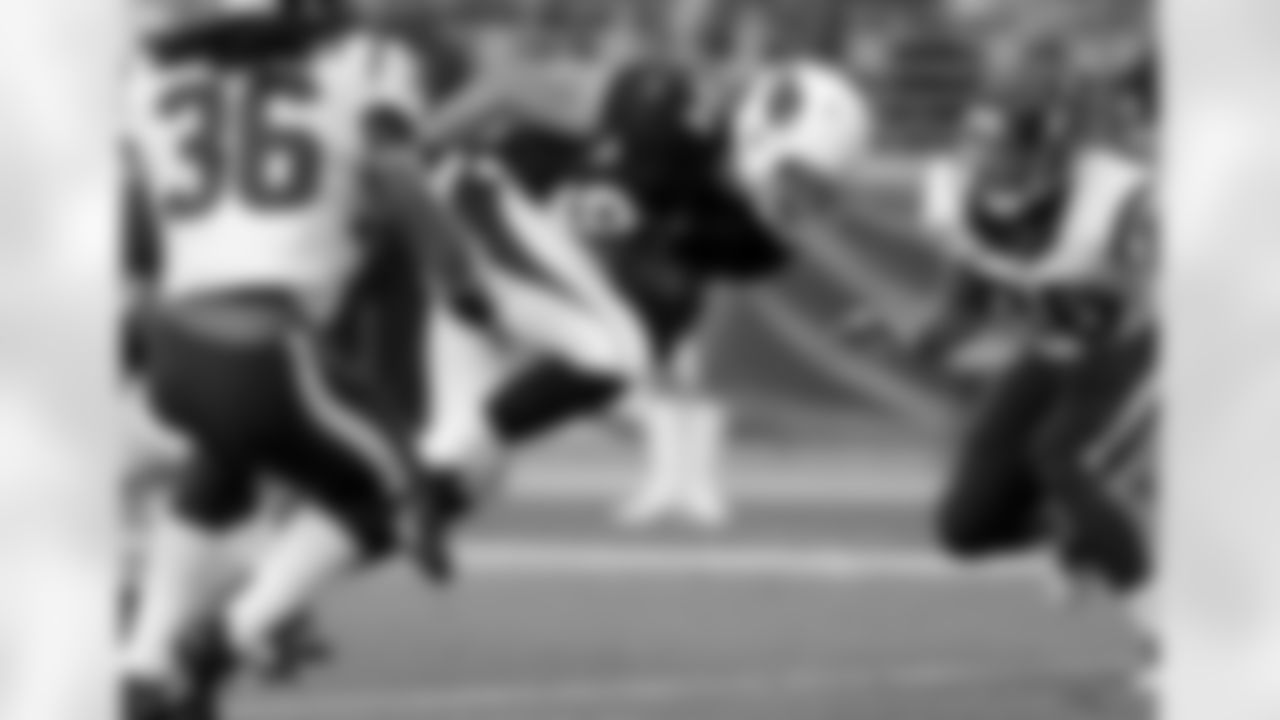 TE Rob Housler catches a touchdown pass from QB Carson Palmer.