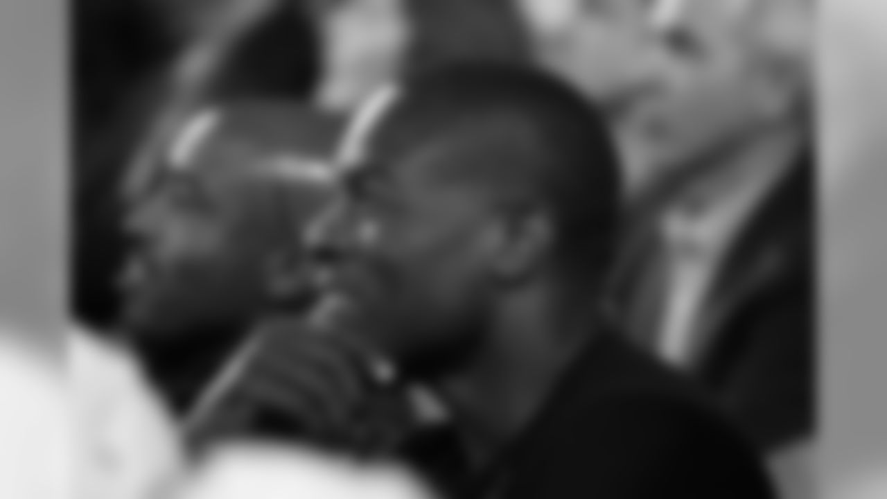 Former Cardinals defensive end and Williams teammate Simeon Rice listens to Aeneas' speech