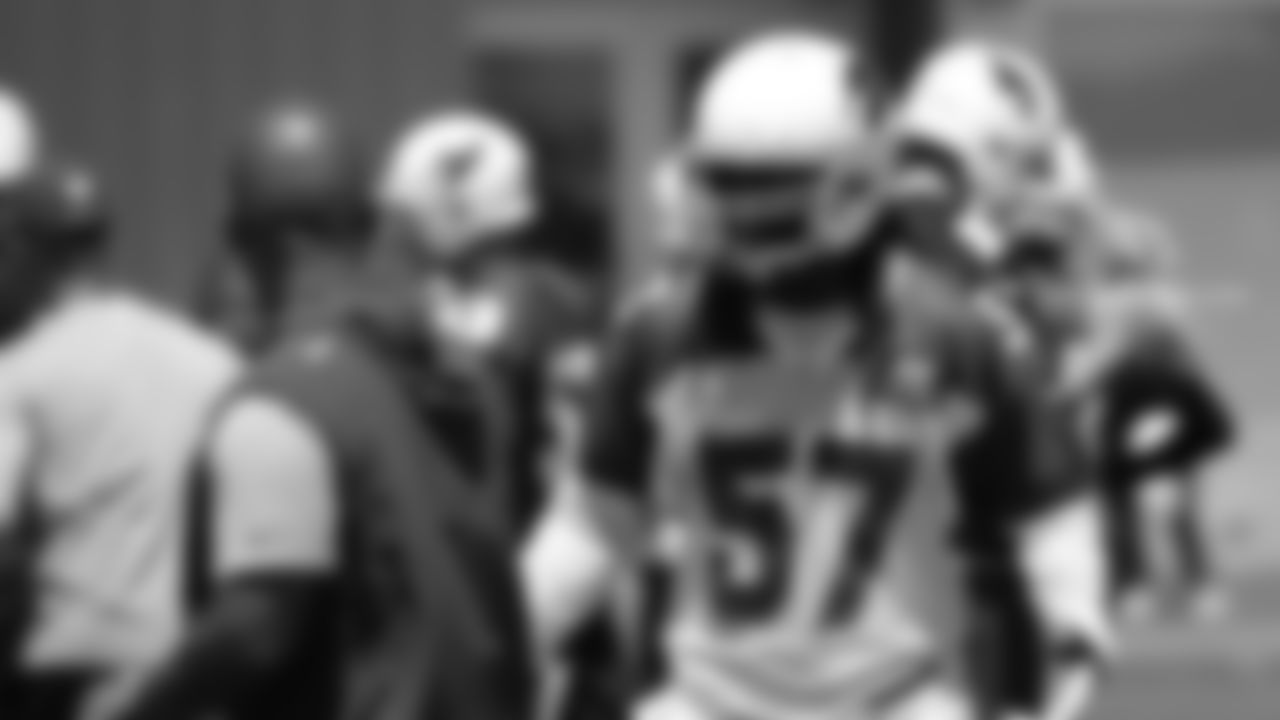 LB Josh Bynes talks to DC Al Holcomb