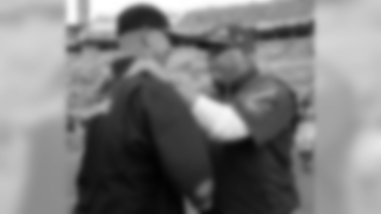 Coach Bruce Arians and Jaguars coach Gus Bradley