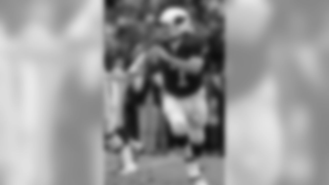 1996: QB Boomer Esiason looks downfield