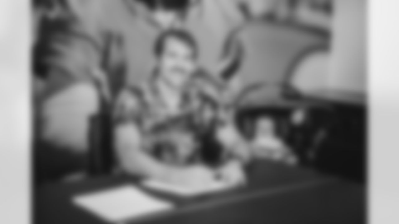 LS Aaron Brewer smiles during the contract.