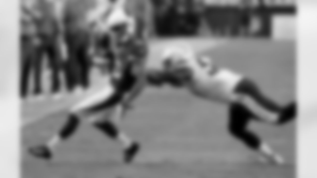 WR John Brown runs after the catch