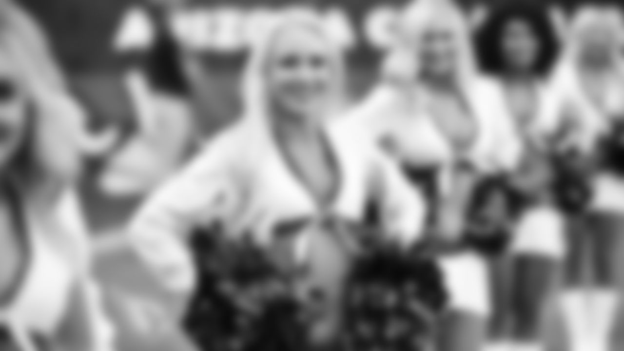 Images of Cardinals cheerleader Davis during the 2019 season