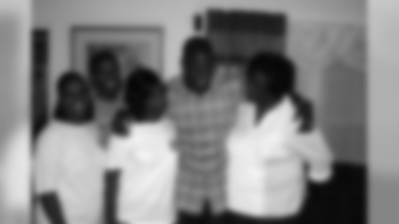Adrian with his family: (from left) sister Nina McNeil, nephew Justin McNeil, sister Tina McNeil and mother Juanita Guy.