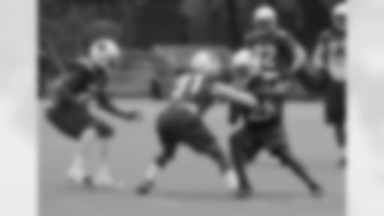 CB Jerraud Powers in special teams work against Justin Bethel and Antoine Cason