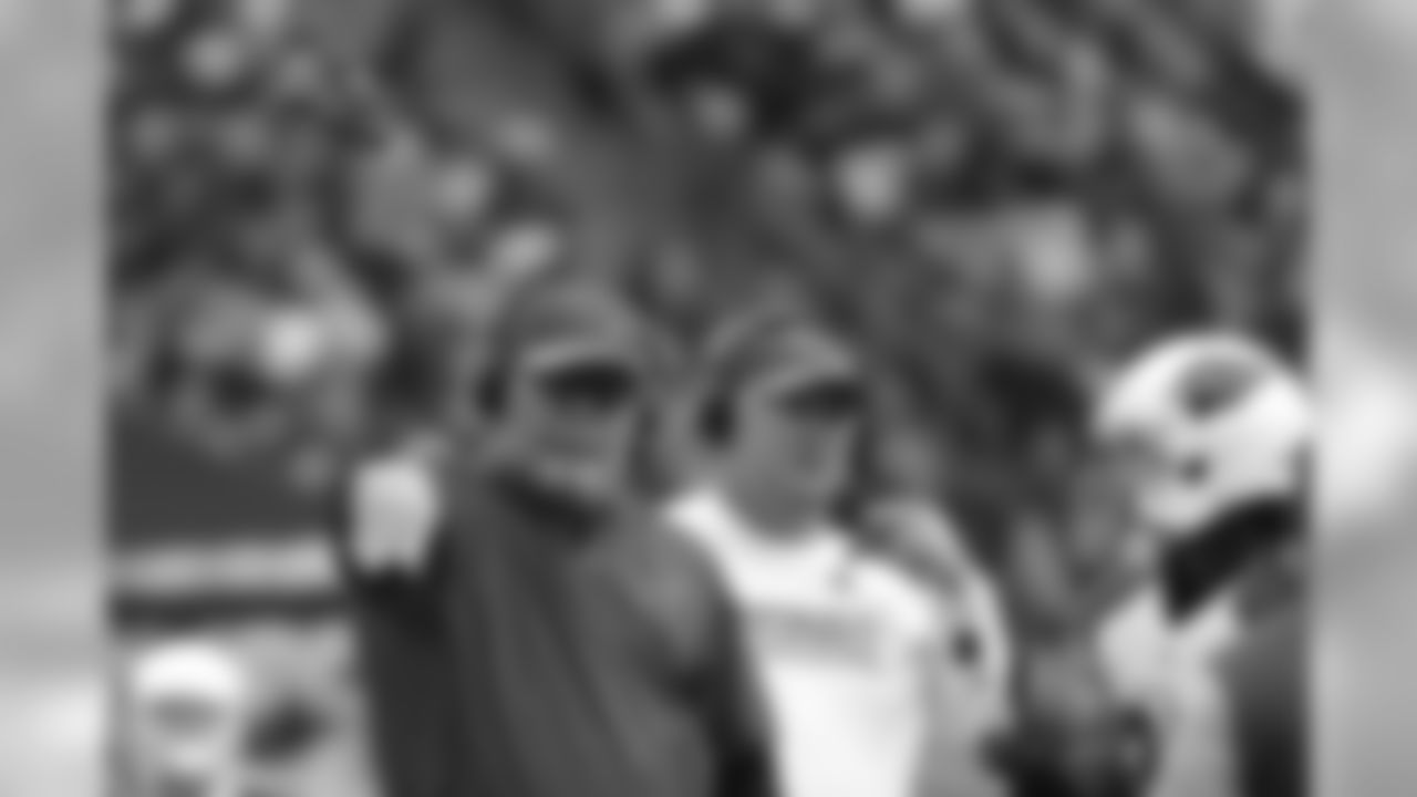 Head coach Bruce Arians throws the challenge flag